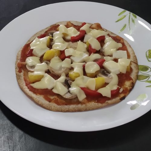 Crispy vegetarian tortilla pizza