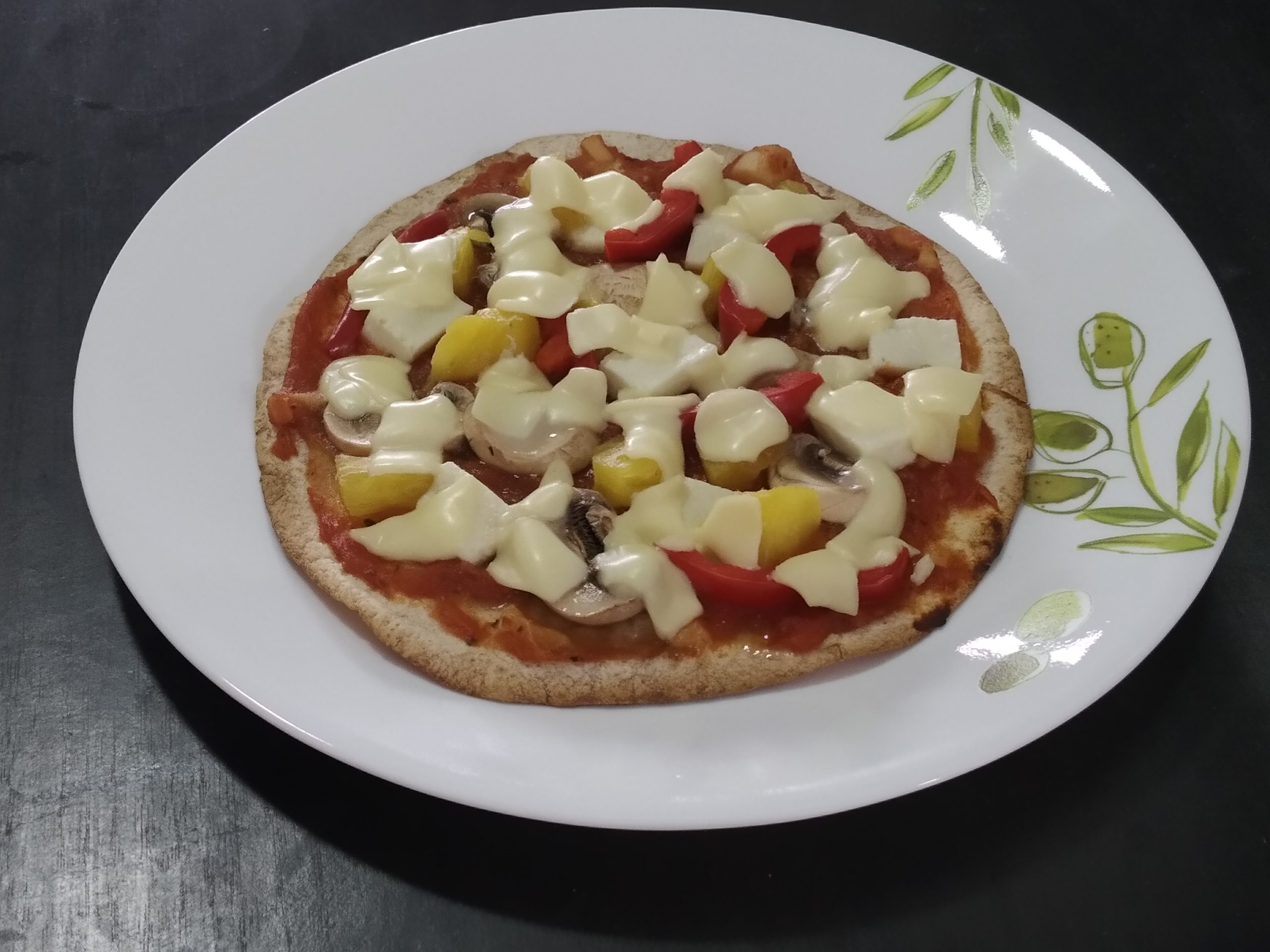 Crispy vegetarian tortilla pizza