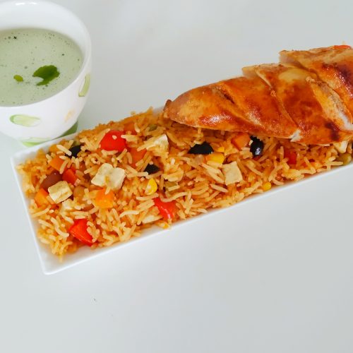 Mexican rice served with rotisserie chicken and mayo